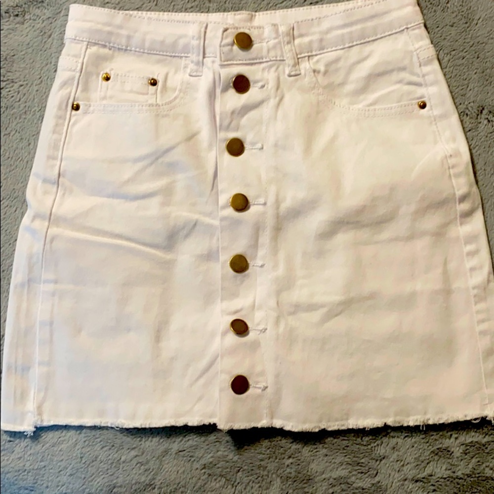 white mini skirt with gold buttons